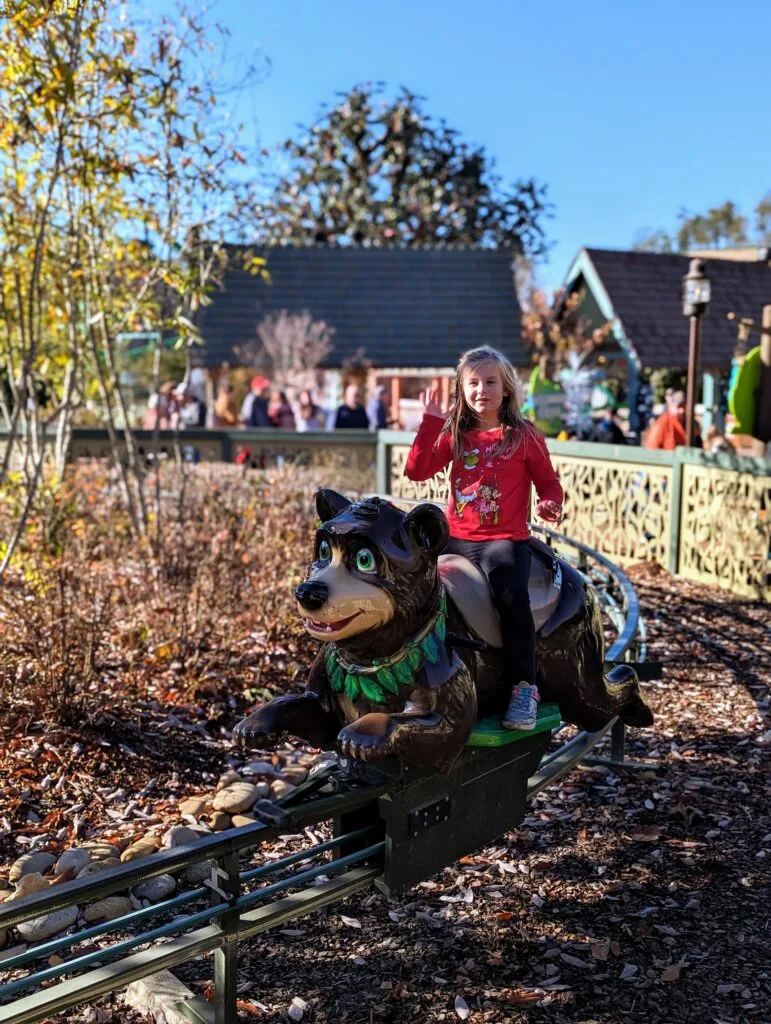 Your Ultimate Guide to Dollywood Rides: Conquer the Coasters 16 Child riding Bear at Black Bear Trail at Dollywood