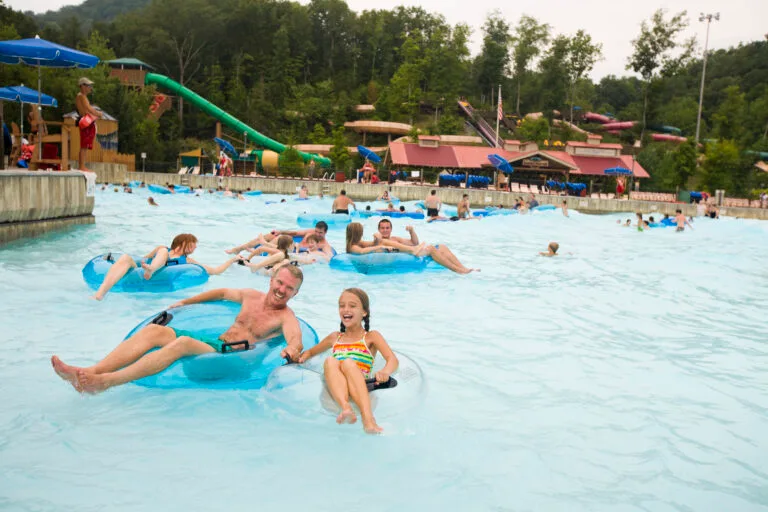 Dollywood’s Splash Country 12 people swimming in mountain waves pool at splash country.