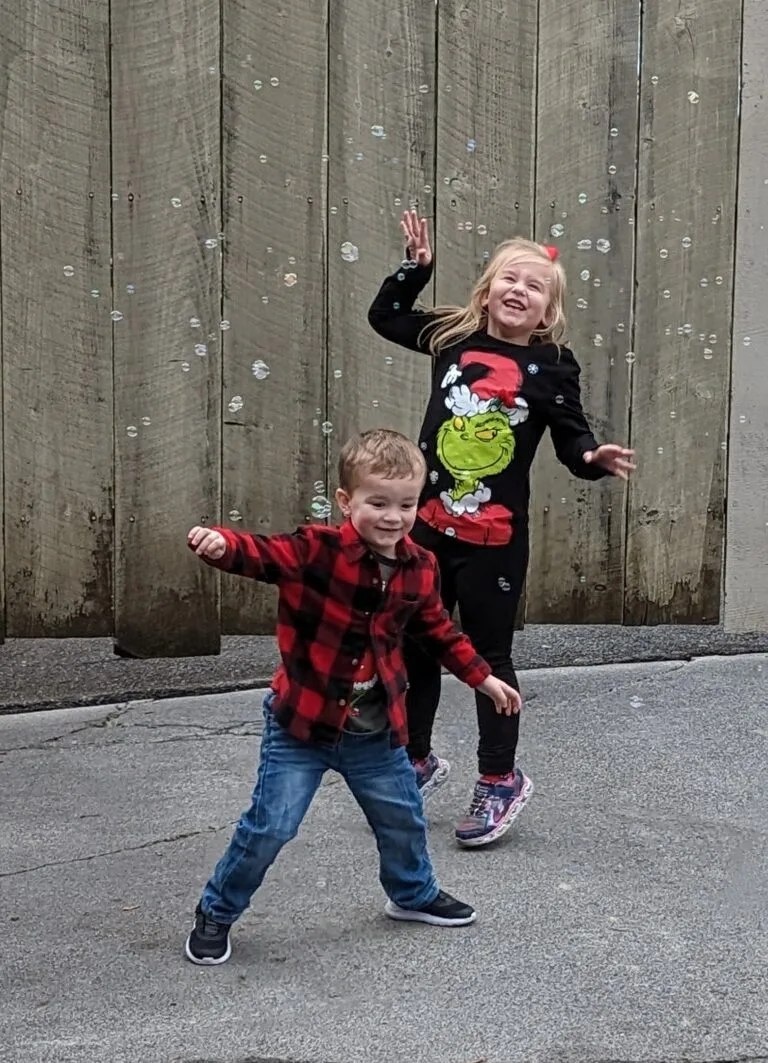 Kids jumping and playing with bubbles at dollywood