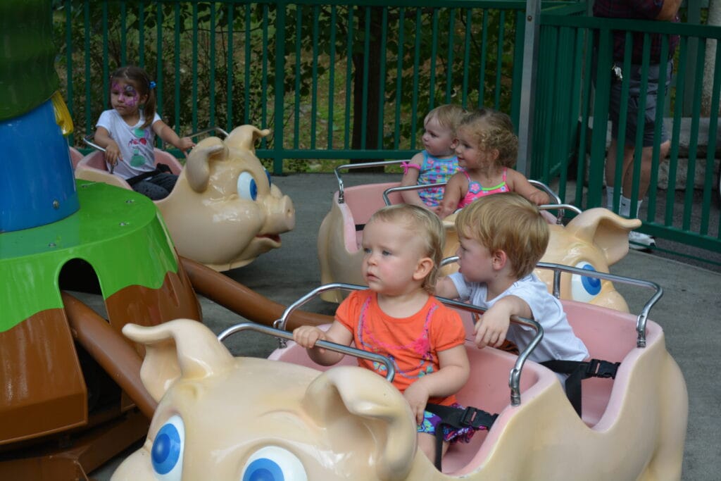 Dollywood Deals for May & June 2025 3 Children on Piggy Parade Ride