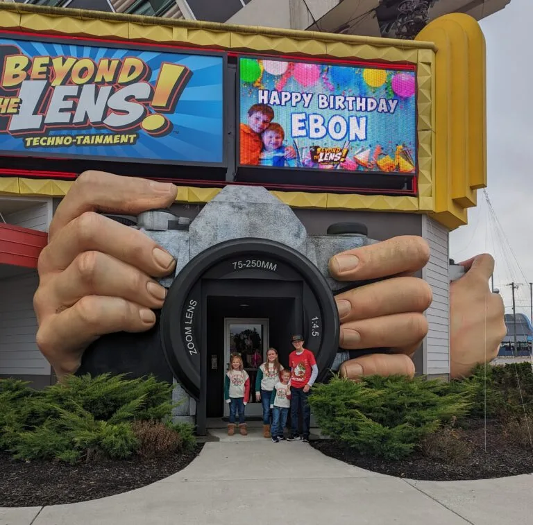 Your Ultimate Guide to Tripster Bundles for Dollywood & Beyond! 6 Family in front of Beyond the Lens