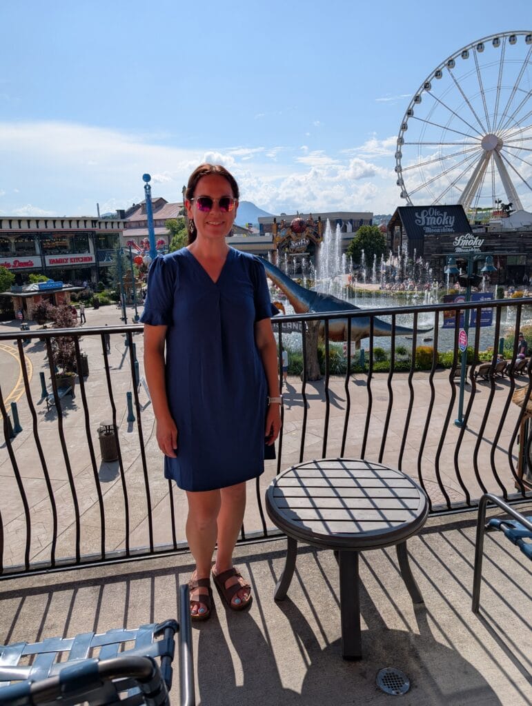 Margaritaville Island Hotel in Pigeon Forge: Paradise in the Smokies 21 Lindsay Harvey standing on a Fountain View Room balcony at Margaritaville Island Hotel in Pigeon Forge, TN