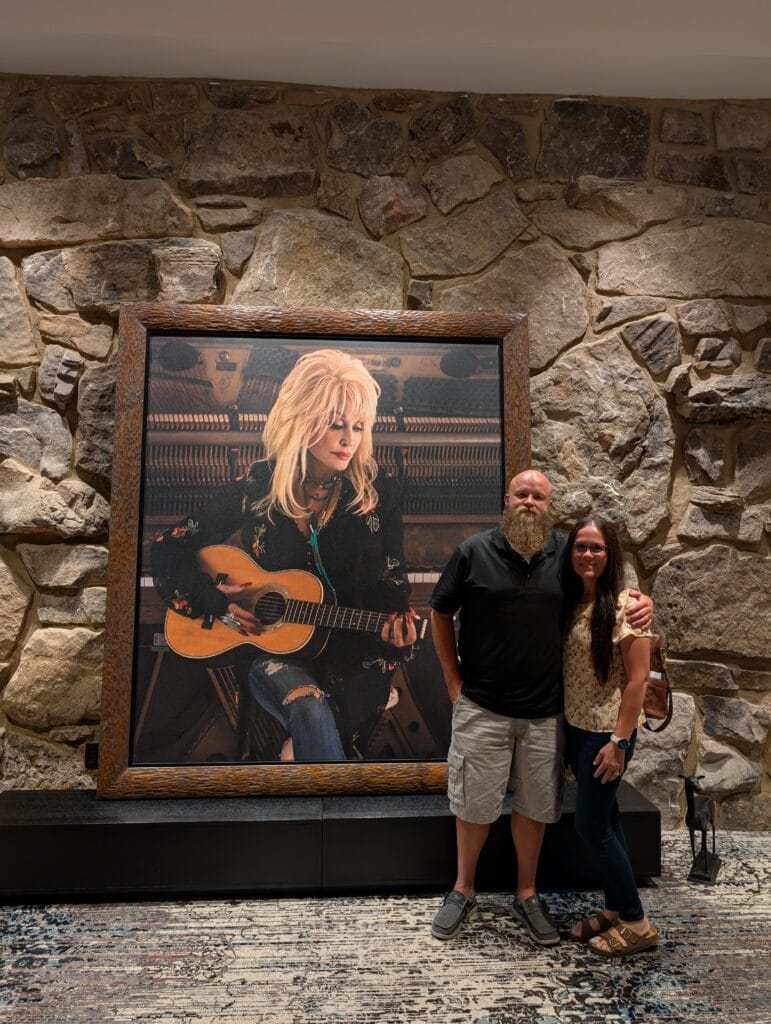 The Ultimate Dollywood Planning Guide 18 Man and Woman in Lobby at at Dollywood's HeartSong Lodge and Resort
