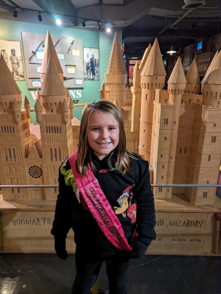 Birthdays in the Smokies: Fun Ways to Celebrate in Pigeon Forge and Gatlinburg 3 Girl in front of sandcastle display at Riley's Believe it or not in Gatlinburg, TN