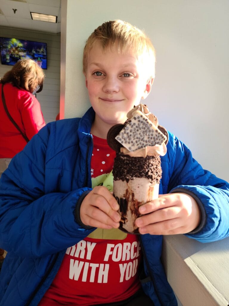 Crazy Mason in Gatlinburg: Gigantic Milkshakes and Sweet Memories 3 Child with Milkshake from Crazy Mason in Gatlinburg TN