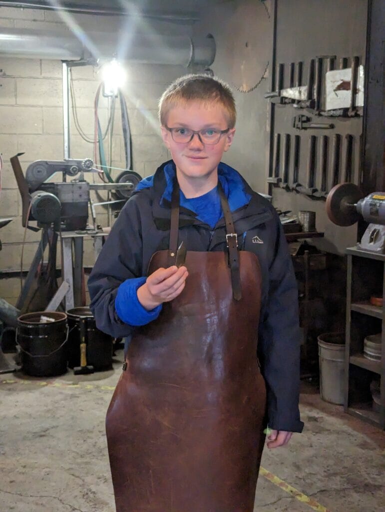 Child with his knife at the knife forging experience at Iron Mountain Metal Craft in Pigeon Forge, TN Photo Credit: Lindsay Harvey-Simply Touring