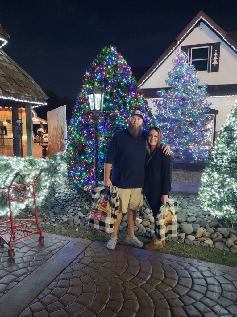 Couple outside of The Incredible Christmas Place in Pigeon Forge, TN Photo Credit: Lindsay Harvey-Simply Touring