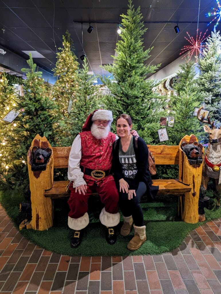 Lindsay Harvey with Santa at The Incredible Christmas Place in Pigeon Forge, TN