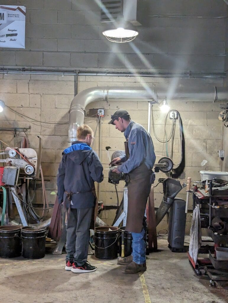 Polishing the Knife at Iron Mountain Metal Craft in Pigeon Forge, TN