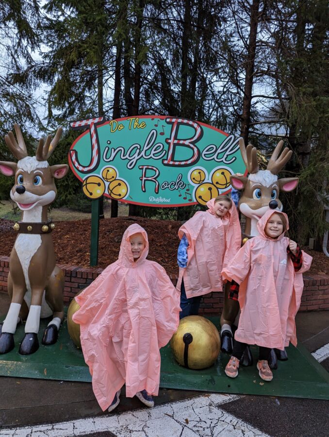 Visiting Dollywood on a Rainy Day: Everything You Need to Know 1 Children in Ponchos at Dollywood during a rain storm