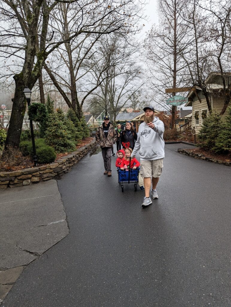 Dollywood Stroller Guide 2 Man pulling a wagon at Dollywood during Rope Drop
