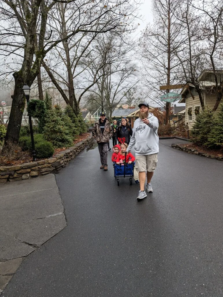 Man pulling a wagon at Dollywood during Rope Drop